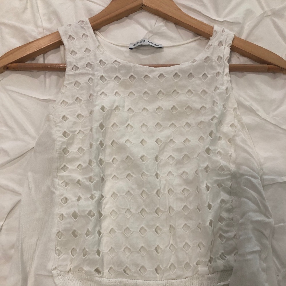 Sleeveless white shirt